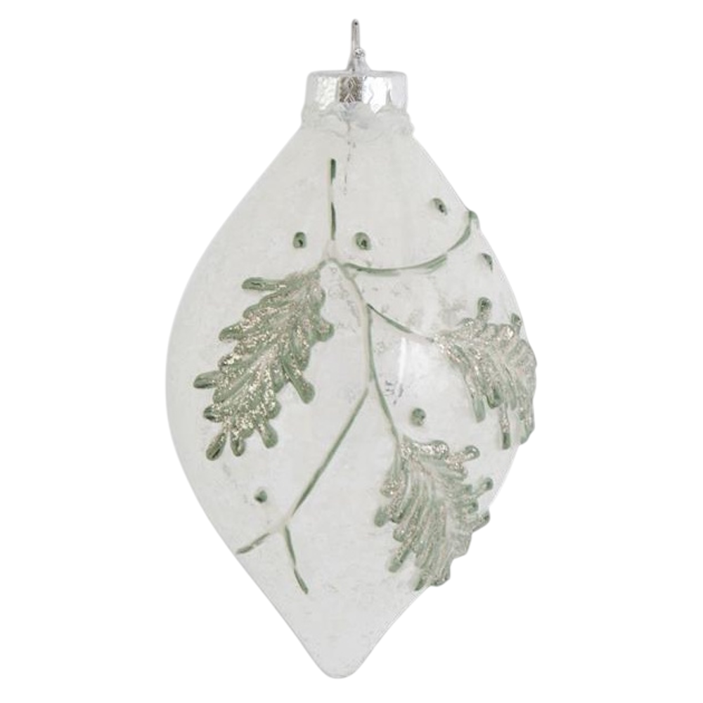Snowy clear glass teardrop ornament with green leaf designs.