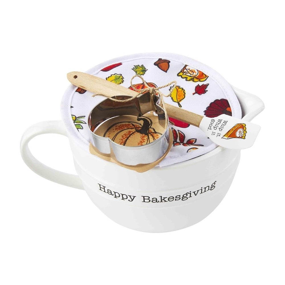 White "Happy Bakesgiving" mixing bowl set with fabric lid, spatula, and pumpkin cookie cutter.