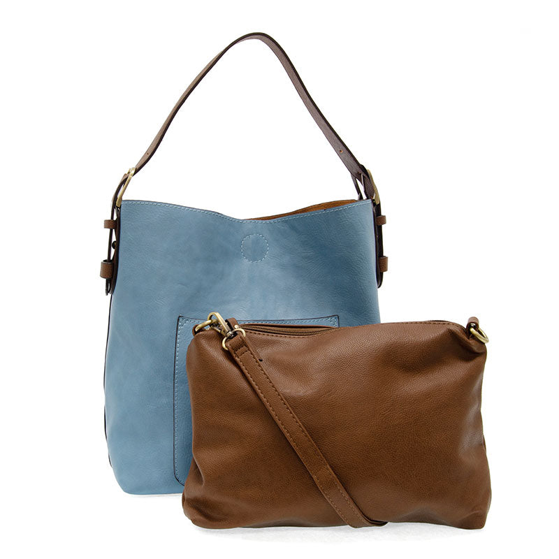Tranquil blue hobo handbag with coffee brown handle and matching brown crossbody clutch bag on a white background.