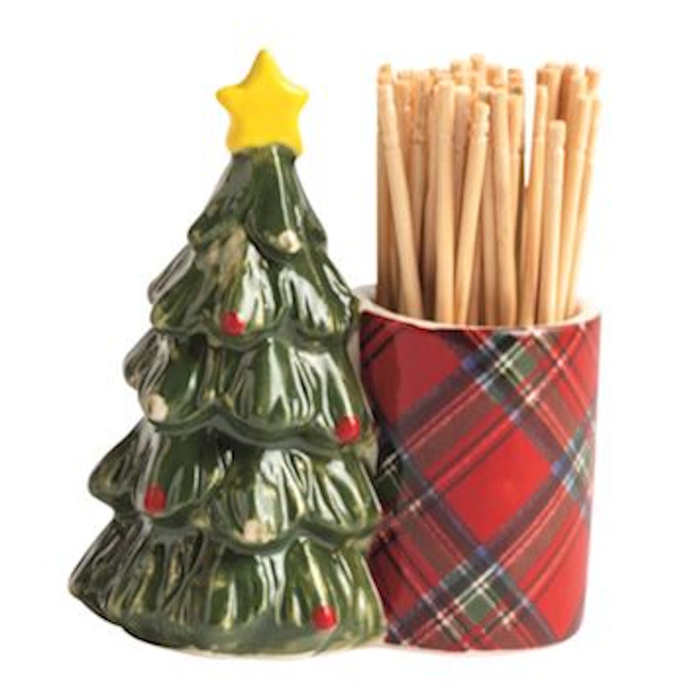 Ceramic Christmas tree figurine with a yellow star next to a red tartan caddy holding toothpicks.