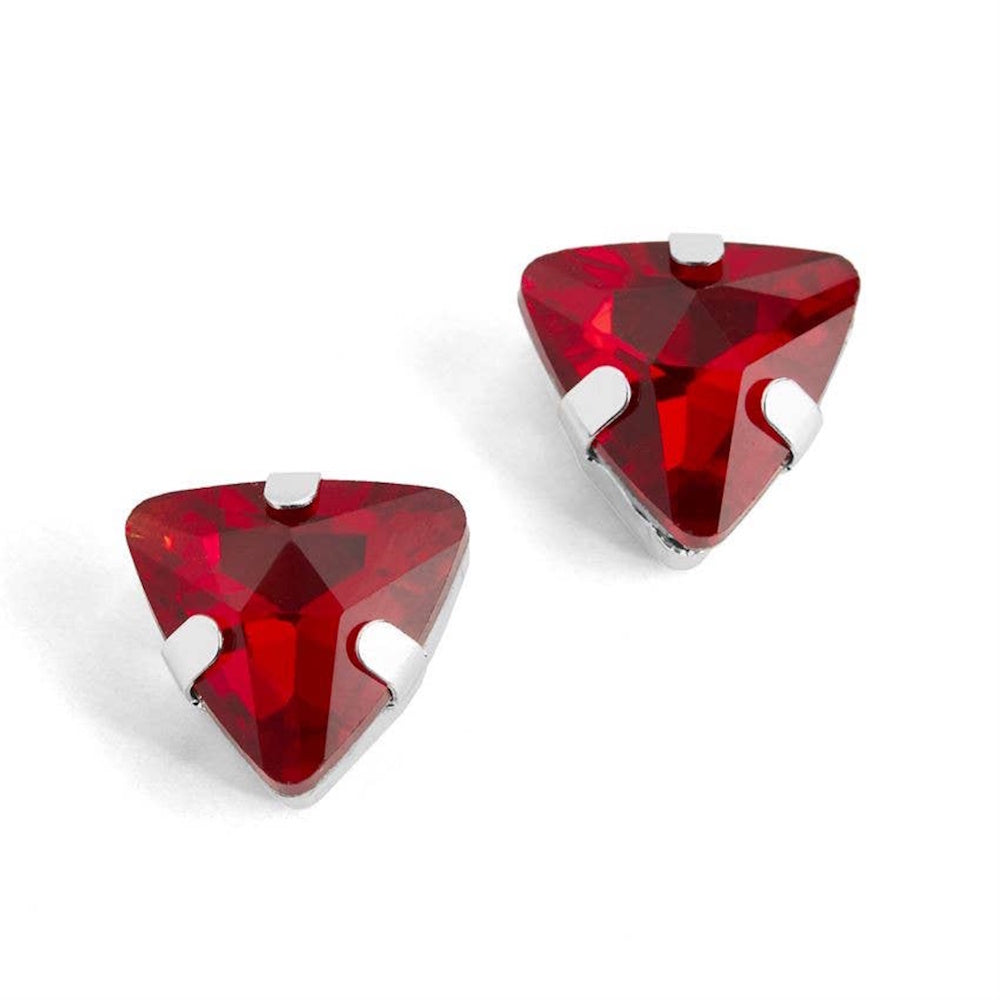 Red triangle jewel stud earrings with silver prongs on white background.