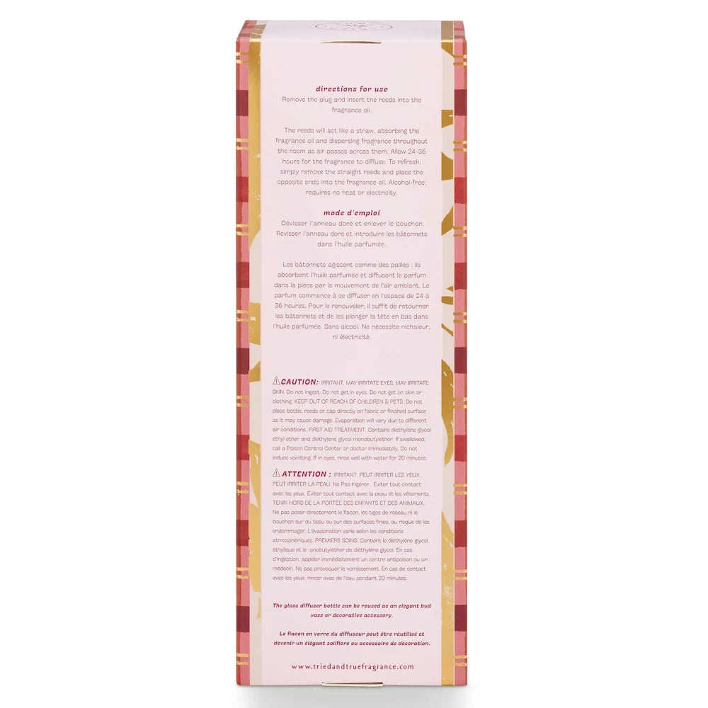 Back of a pink plaid diffuser box showing directions for use and caution text.
