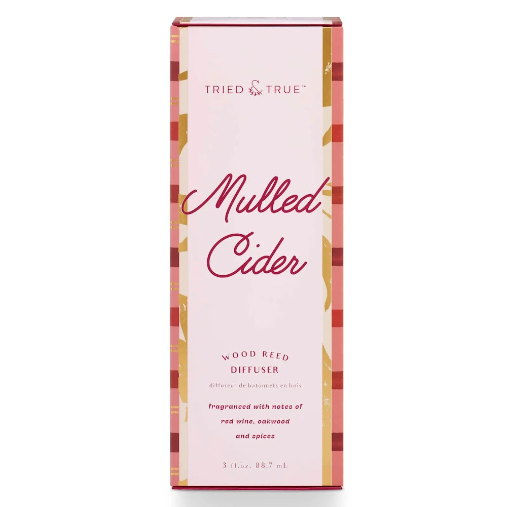 Tried & True Mulled Cider wood reed diffuser packaging box with pink and red plaid accents.