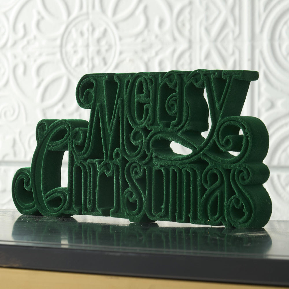 Velvet resin green "Merry Christmas" tabletop cutout decor.