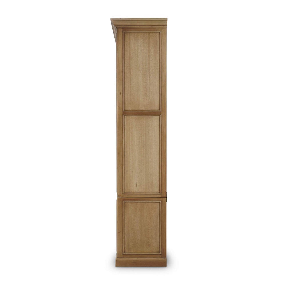 Side profile view of a tall light wood Victoria bookcase with paneled details on a white background.