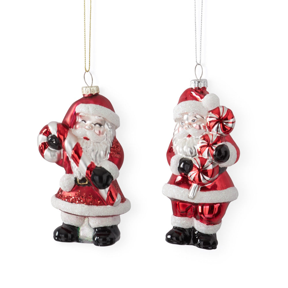Two hanging vintage glass Santa ornaments with candy.