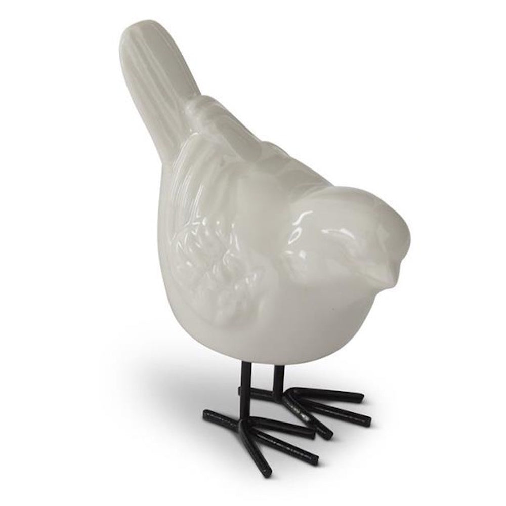 White porcelain bird figurine with glossy finish and black metal legs on a plain white background.