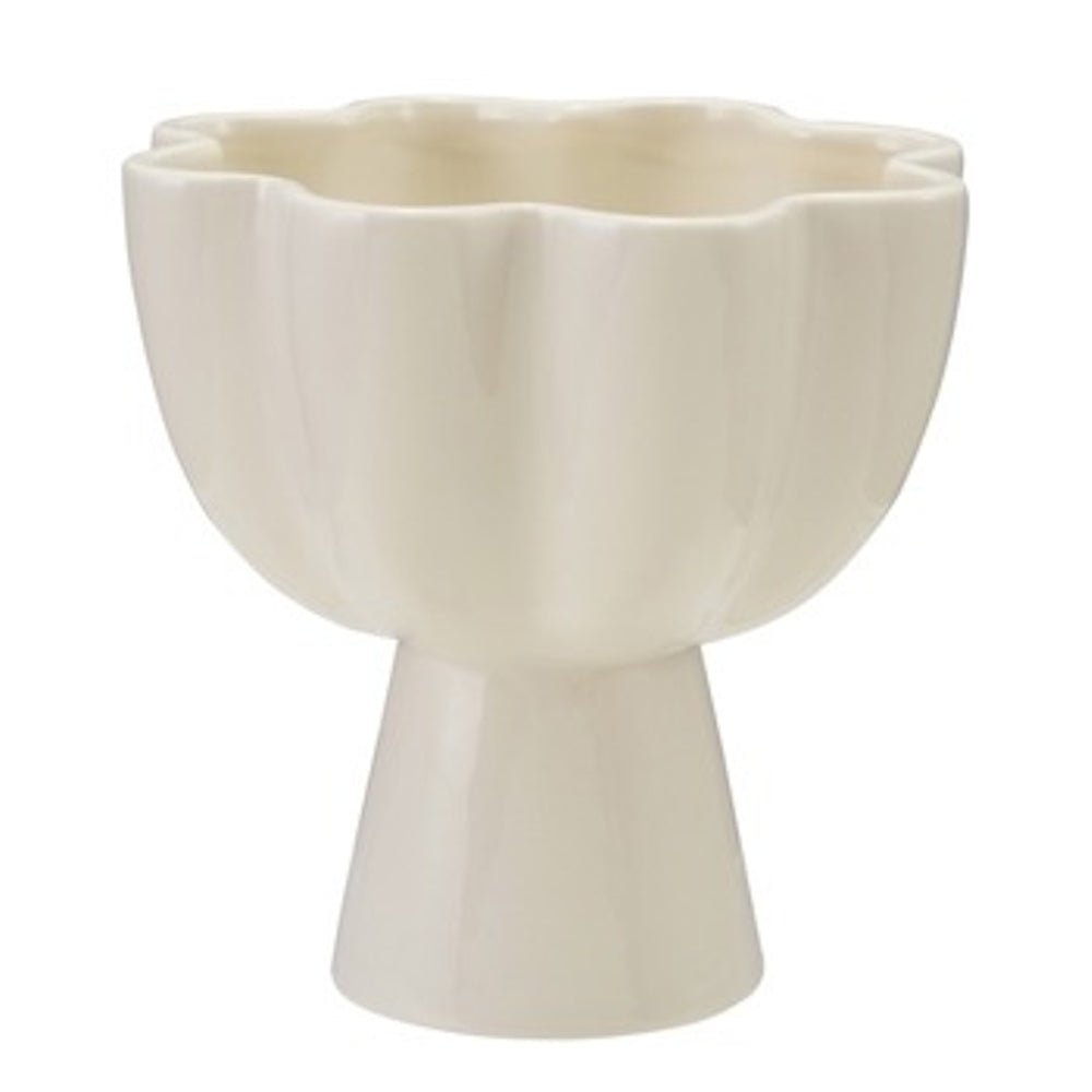 White stoneware pedestal bowl with a scalloped, flower-shaped rim and a conical base against a white background.