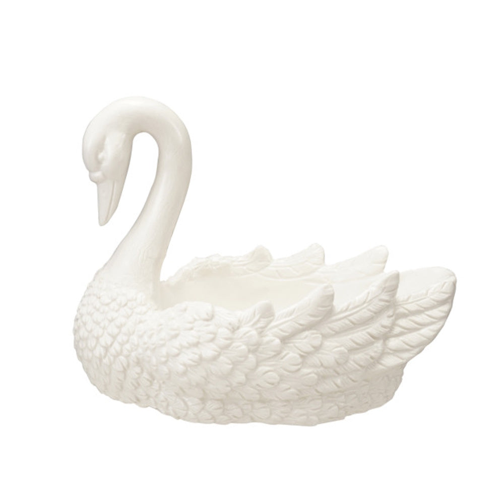 White ceramic swan-shaped decorative dish with detailed feather textures on a plain background.