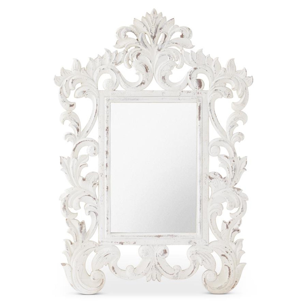 Whitewashed ornate scroll wood framed wall mirror with a distressed vintage finish and elegant baroque style carvings.