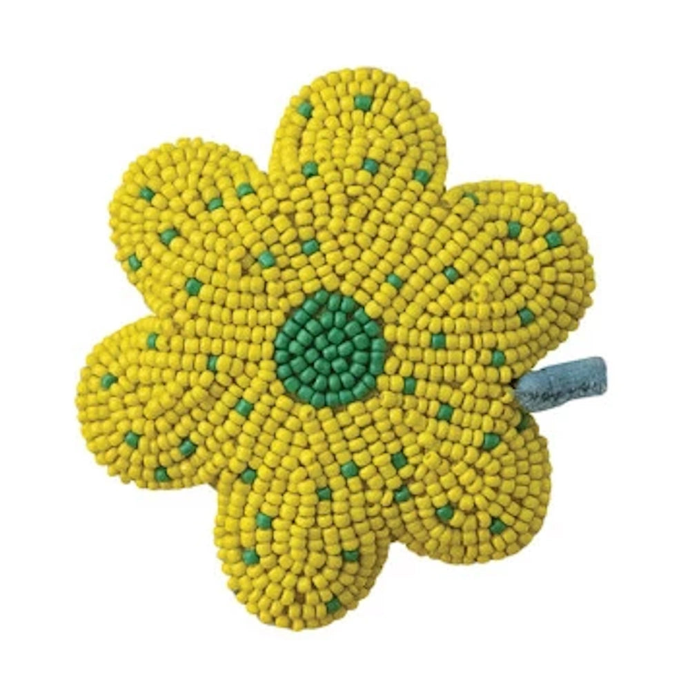 Handmade yellow and green glass beaded flower-shaped retractable tape measure for sewing and crafts.